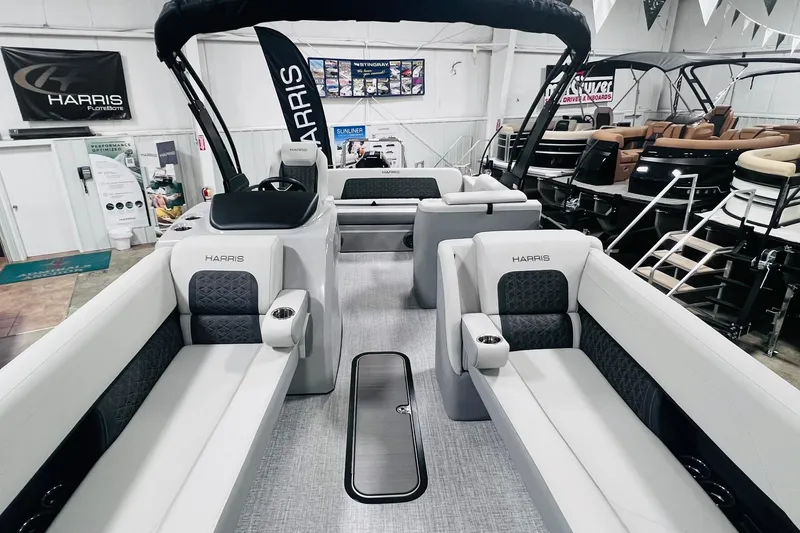 Slide: The Image of 2025 Harris Solstice 250 pontoon boat interior with luxurious seating and modern design. - 6