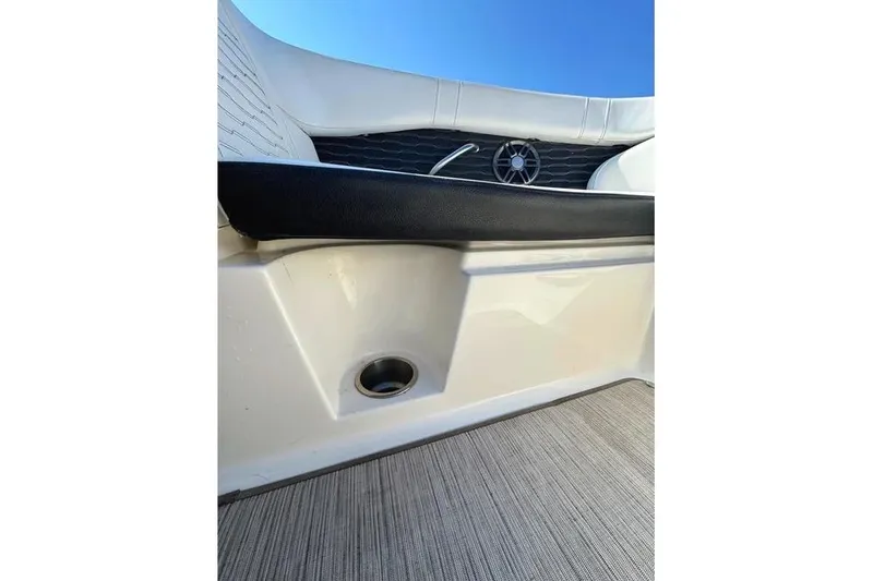 Slide: The Image of 2022 Sea Ray SPX 230 Outboard interior detail with seating and speaker. - 16