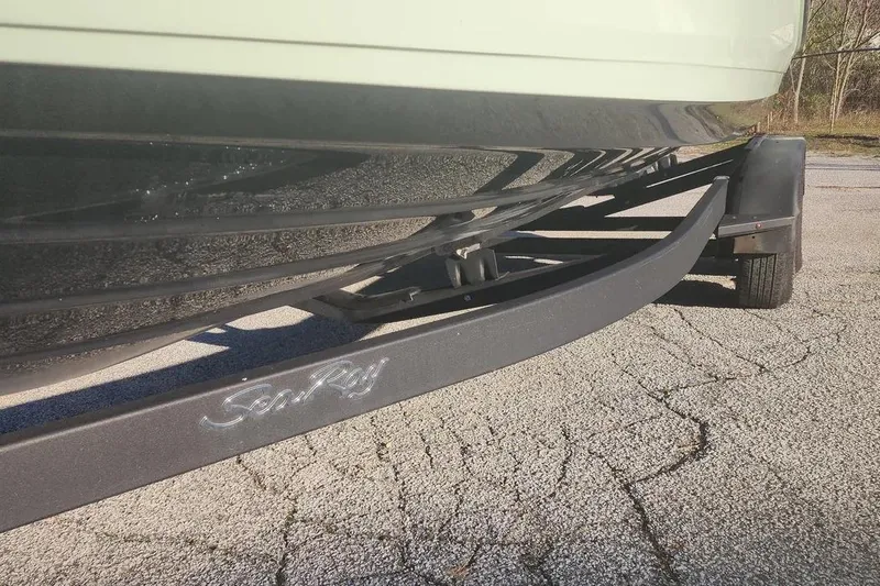 Slide: The Image of 2022 Sea Ray SPX 230 Outboard boat on trailer, close-up view. - 39