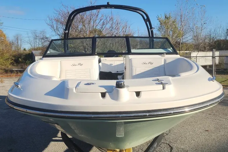 Slide: The Image of 2022 Sea Ray SPX 230 Outboard boat, front view, parked outdoors. - 40