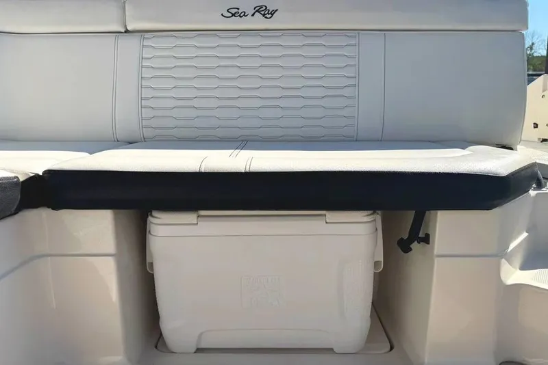 Slide: The Image of 2022 Sea Ray SPX 230 Outboard boat seating with integrated cooler storage. - 7