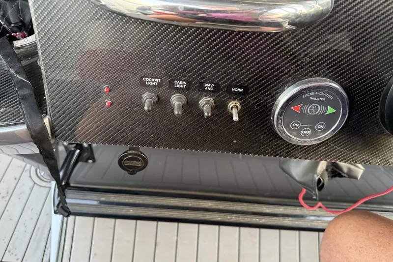 Slide: The Image of Control panel of a 2018 Nor-Tech 340 Sport Center Console boat. - 21