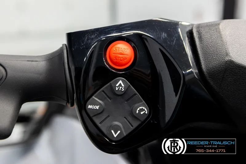 Slide: The Image of Close-up of 2024 Sea Doo 170 Wake GTI handlebar controls with start/stop button. - 16