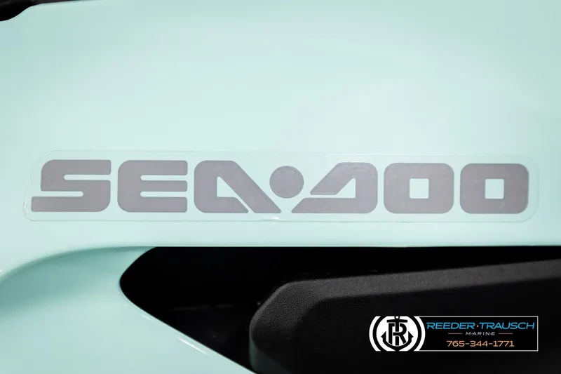 Slide: The Image of 2024 Sea Doo 170 Wake GTI logo on light blue surface, Reeder-Trausch Marine branding. - 23