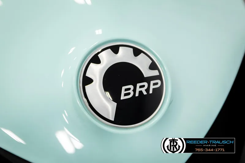 Slide: The Image of BRP logo on 2024 Sea Doo 170 Wake GTI, light blue background. - 28