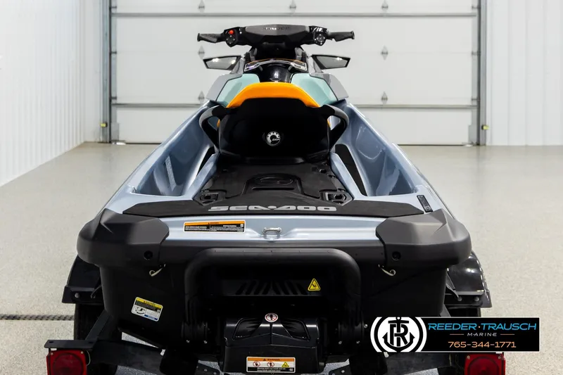 Slide: The Image of 2024 Sea Doo 170 Wake GTI jet ski in a showroom, rear view. - 5