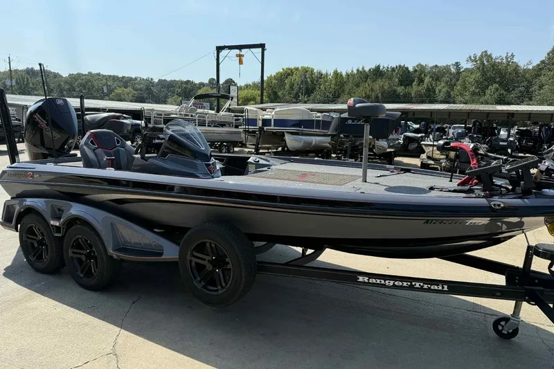 Slide: The Image of 2023 Ranger Z520R 55th Anniversary Limited Edition boat on trailer, parked outdoors. - 0