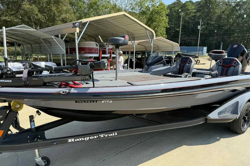 Slide: The Image of 2023 Ranger Z520R 55th Anniversary Limited Edition boat on trailer, parked outdoors. - 1