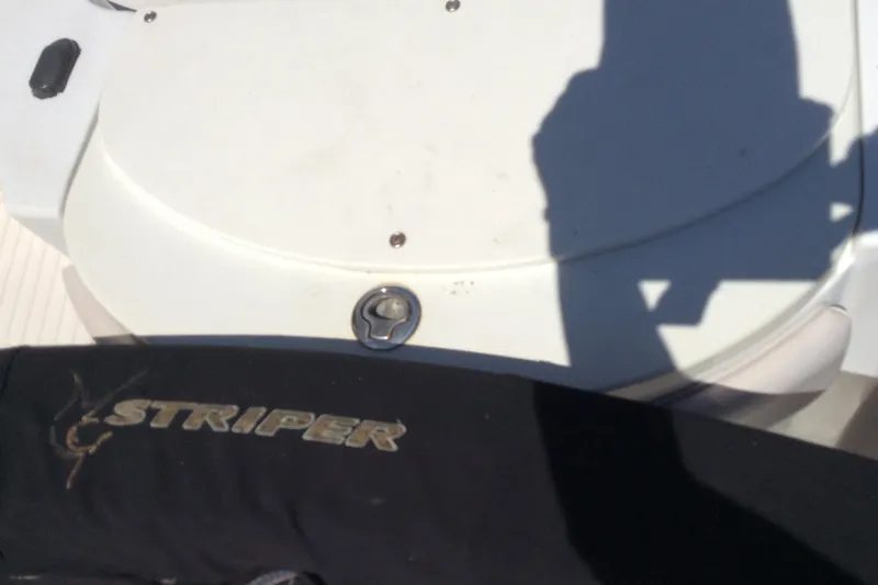 Slide: The Image of 2005 Seaswirl Striper 2101 Center Console boat detail with logo and shadow. - 11