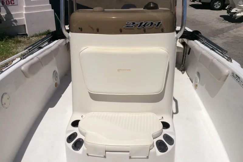 Slide: The Image of 2005 Seaswirl Striper 2101 Center Console boat interior with seating and storage. - 7