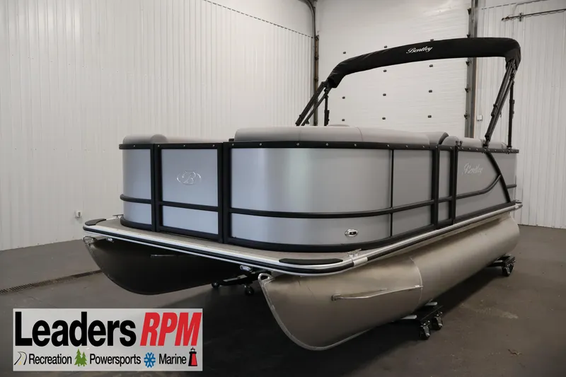 The Image of 2026 Bentley Pontoons 160 Cruise LE in showroom, featuring sleek design and modern amenities. - 0