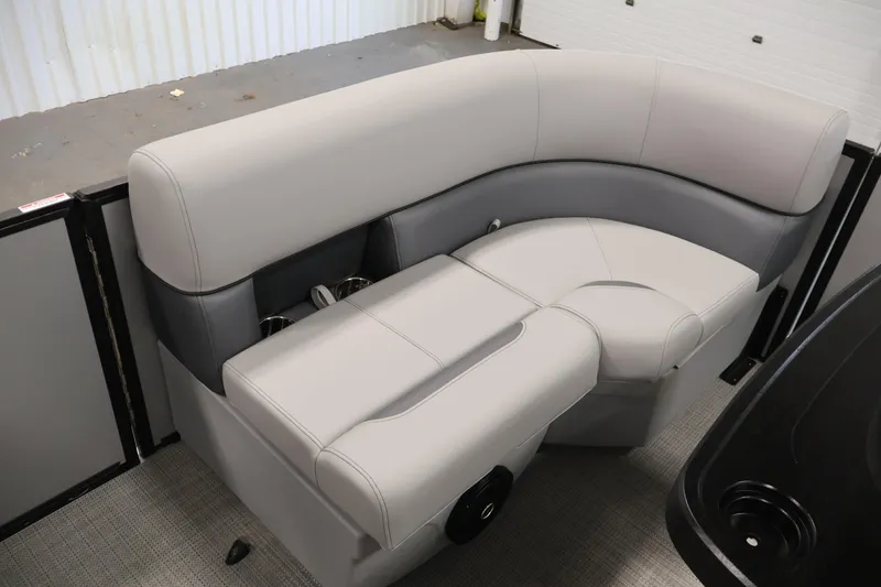 Slide: The Image of 2026 Bentley Pontoons 160 Cruise LE interior seating with gray upholstery and cup holders. - 11