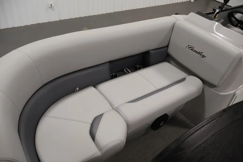 Slide: The Image of 2026 Bentley Pontoons 160 Cruise LE interior with elegant seating and Bentley logo. - 13