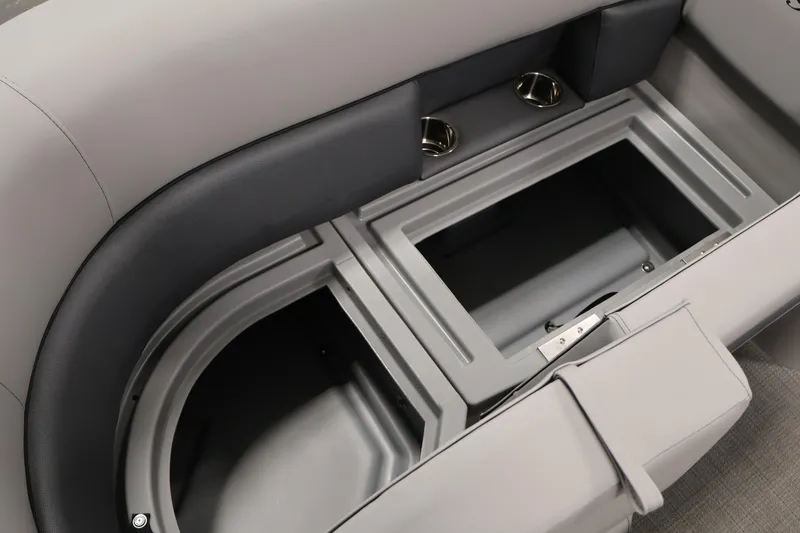Slide: The Image of 2026 Bentley Pontoons 160 Cruise LE interior storage compartment with cup holders. - 14