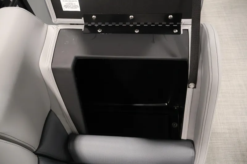 Slide: The Image of Storage compartment in 2026 Bentley Pontoons 160 Cruise LE boat, featuring sleek upholstery design. - 26
