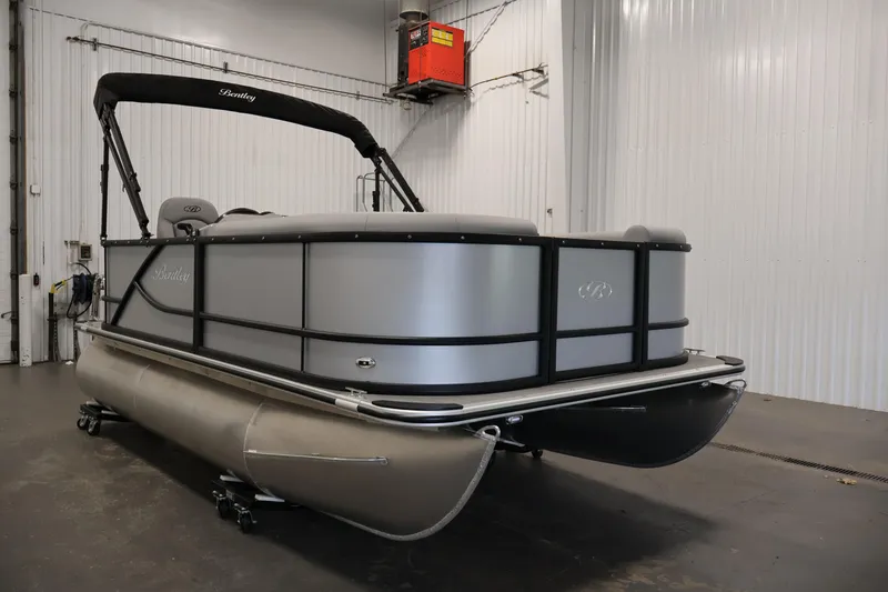 Slide: The Image of Top view of 2026 Bentley Pontoons 160 Cruise LE layout, featuring spacious seating arrangement. - 33