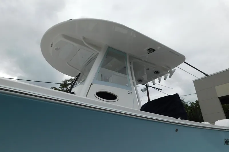 Slide: The Image of 2026 Regulator 28 boat with sleek design and modern features, viewed from below. - 5
