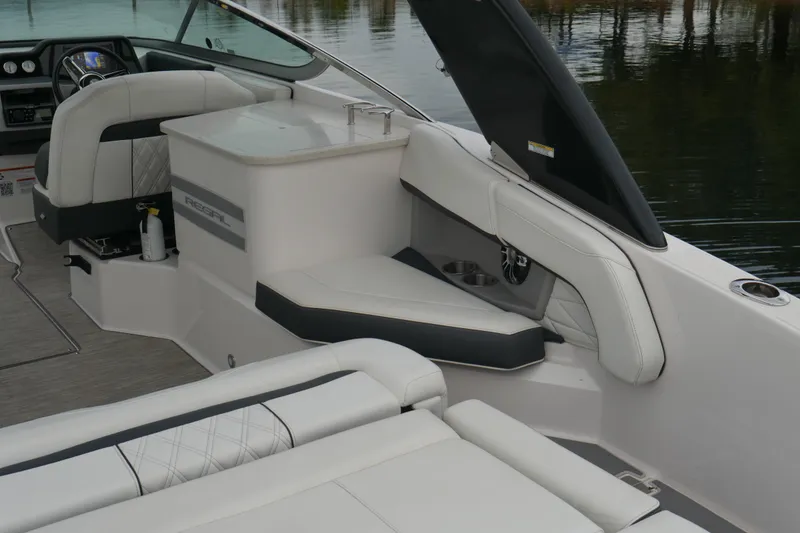 Slide: The Image of 2019 Regal 26 FasDeck boat interior with luxurious seating and modern design. - 29