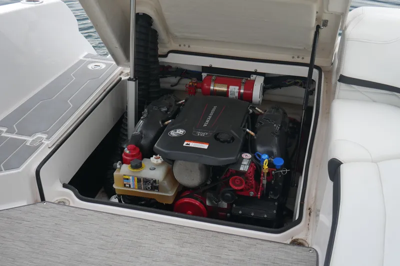 Slide: The Image of Engine compartment of a 2019 Regal 26 FasDeck boat, featuring a Volvo Penta engine. - 33