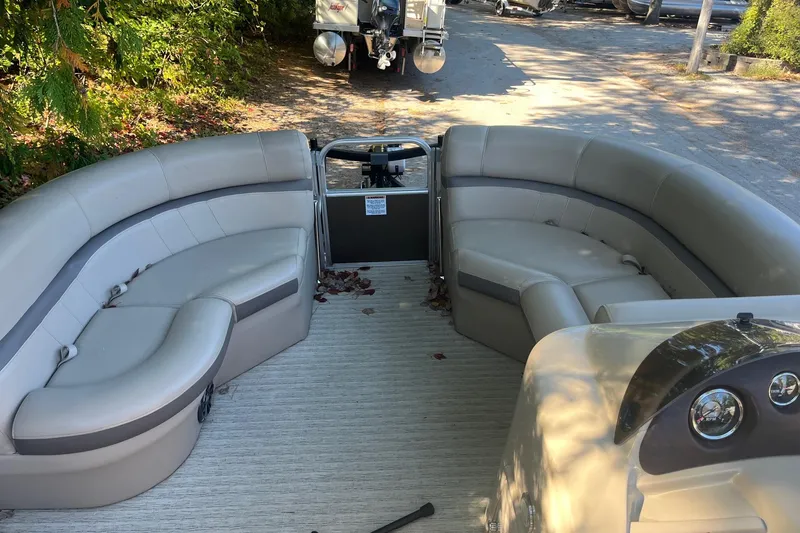 Slide: The Image of 2018 Berkshire 22 Quad Bench Tritoon with spacious seating and modern design. - 5