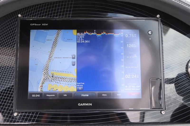 Slide: The Image of Garmin GPS display on 2018 Regal 29 OBX boat, showing navigation and sonar data. - 28