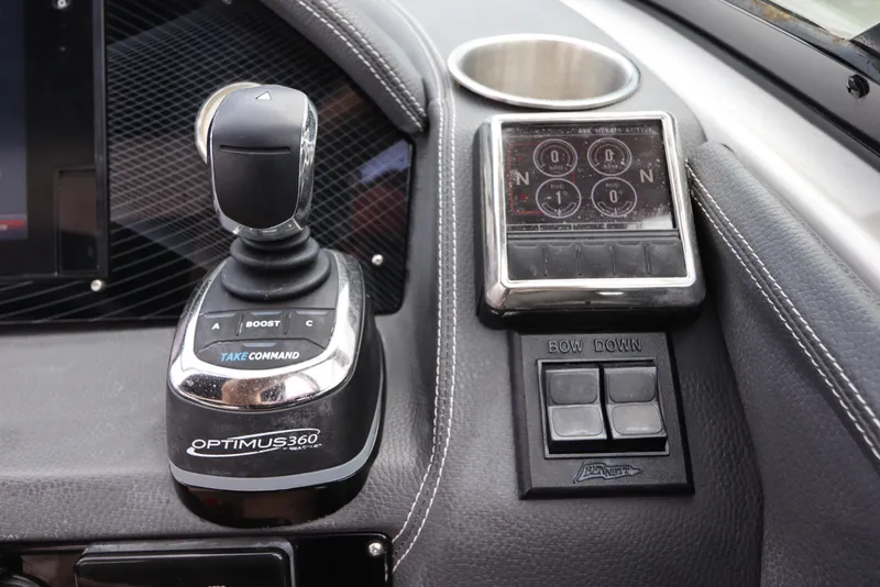 Slide: The Image of 2018 Regal 29 OBX boat controls with Optimus 360 joystick and navigation display. - 29