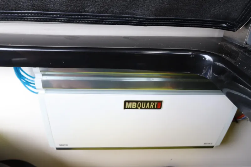 Slide: The Image of MB Quart audio amplifier in 2018 Regal 29 OBX boat interior. - 31