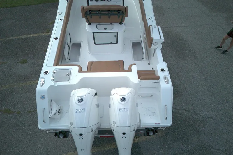 Slide: The Image of 2026 Sea Hunt Gamefish 27 Coffin Box boat with twin engines, aerial view. - 3