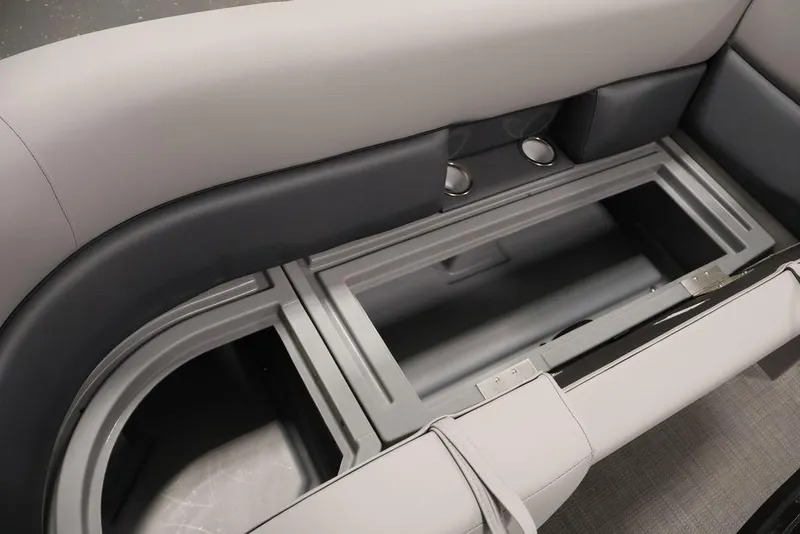 Slide: The Image of 2026 Bentley Pontoons 240 Swingback storage compartment with sleek seating design. - 15