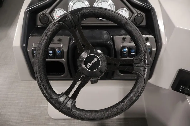 Slide: The Image of Steering wheel of 2026 Bentley Pontoons 240 Swingback with dashboard controls. - 20
