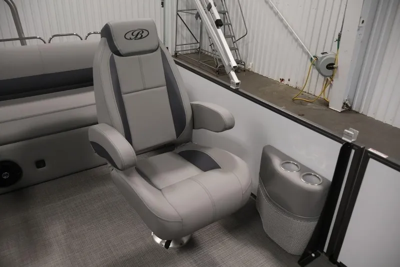 Slide: The Image of 2026 Bentley Pontoons 240 Swingback interior with luxurious seating and cup holders. - 22