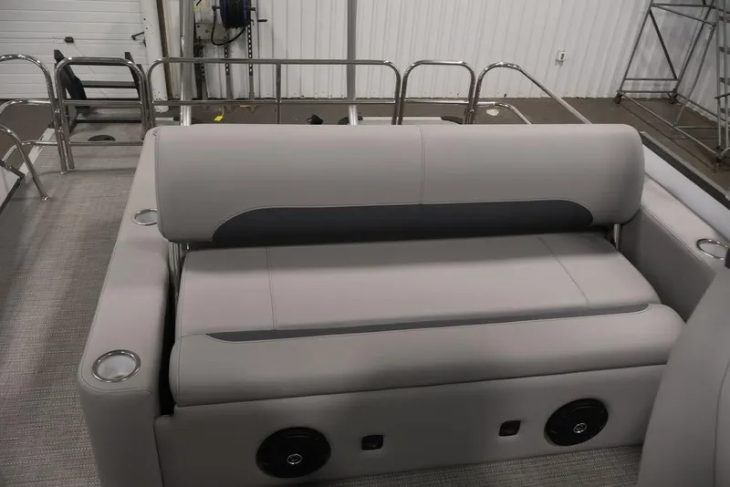 Slide: The Image of 2026 Bentley Pontoons 240 Swingback interior with gray seating and cup holders. - 26