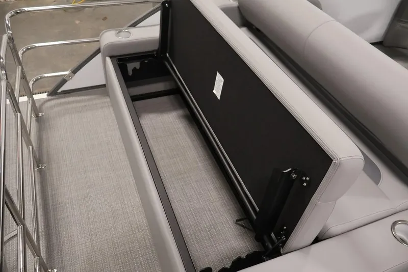 Slide: The Image of 2026 Bentley Pontoons 240 Swingback interior with open storage compartment. - 28