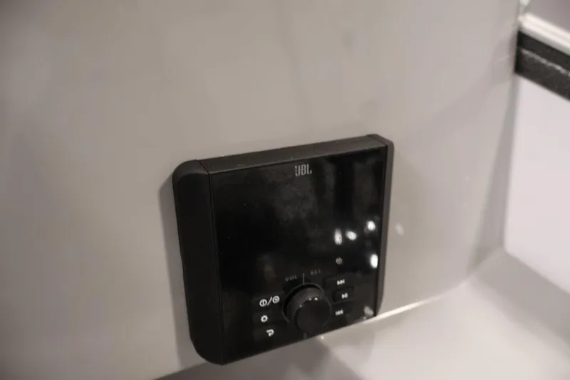 Slide: The Image of JBL audio control panel on 2026 Bentley Pontoons 240 Swingback boat. - 33
