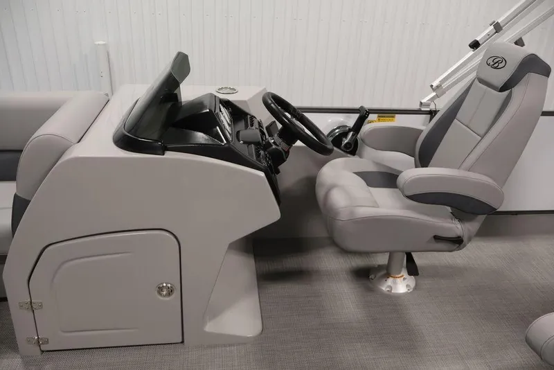 Slide: The Image of 2026 Bentley Pontoons 240 Swingback helm with modern steering and comfortable seating. - 35