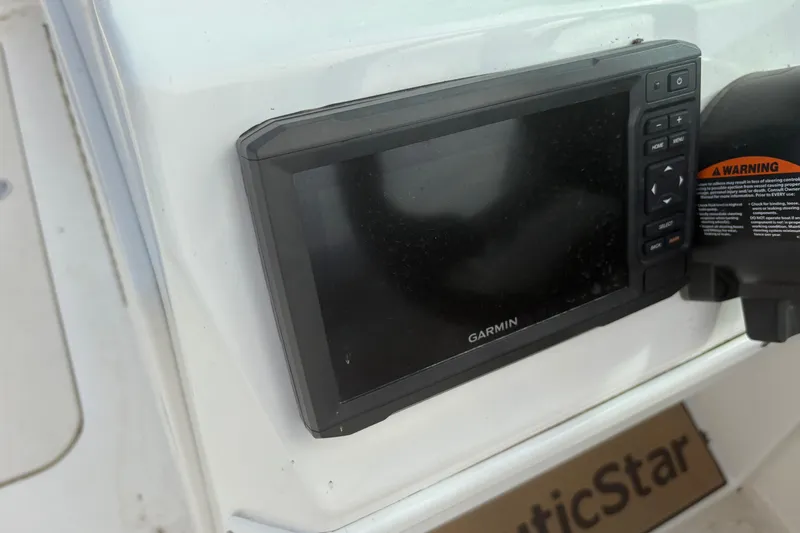 Slide: The Image of Garmin display on 2022 NauticStar 203 DC boat dashboard. - 18
