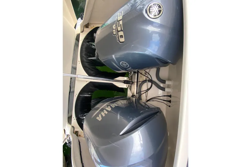 Slide: The Image of 2014 Pursuit SC 365i Sport Coupe with twin Yamaha 350 V8 outboard engines. - 57