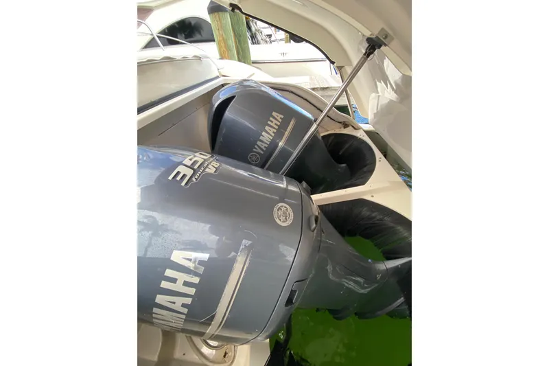 Slide: The Image of Overhead view of 2014 Pursuit SC 365i Sport Coupe docked on water. - 58