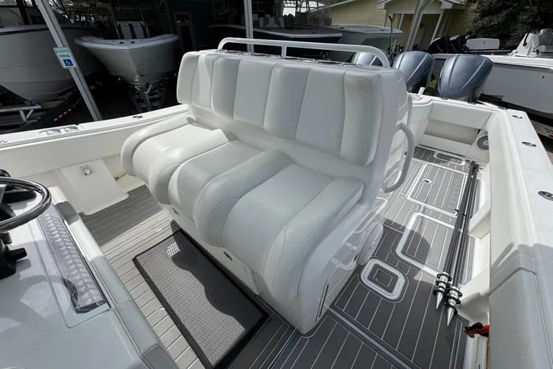 Slide: The Image of 2019 Invincible 39 Open Fisherman boat interior with white seating and modern design. - 29