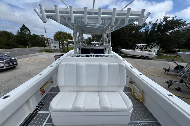 Slide: The Image of 2019 Invincible 39 Open Fisherman boat with white seating and rod holders. - 38