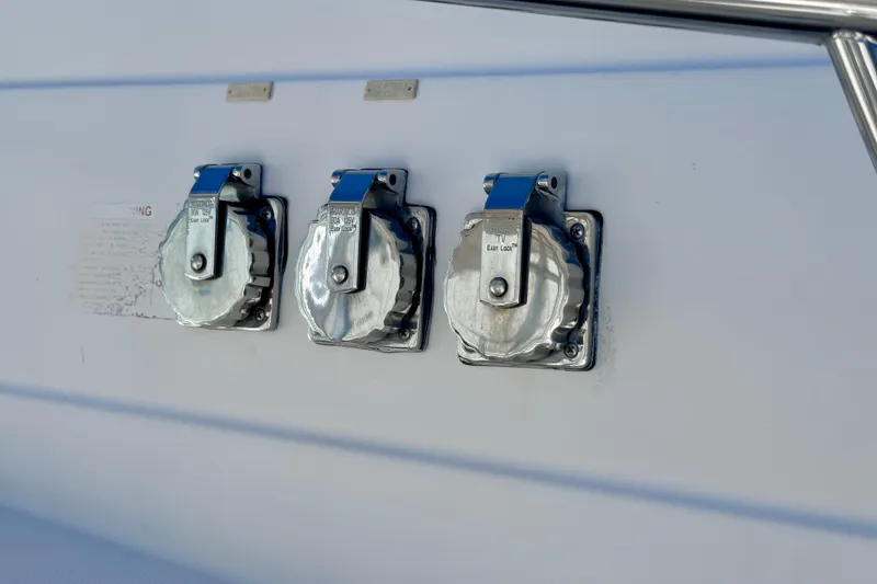 Slide: The Image of Fuel caps on a 2001 Wellcraft 290 Coastal boat. - 35