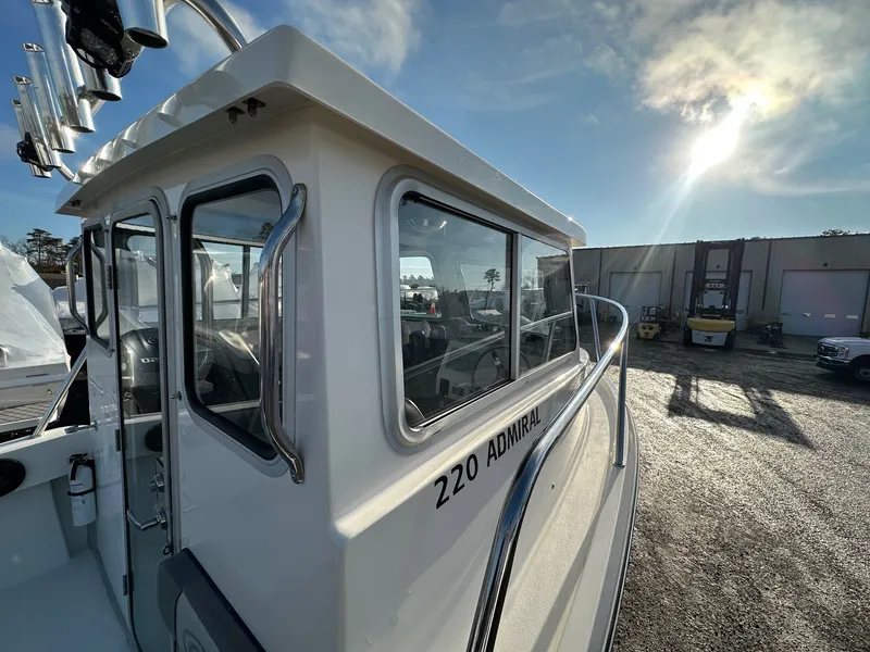 Slide: The Image of 2024 Defiance 220 Admiral EX boat in sunlight. - 39