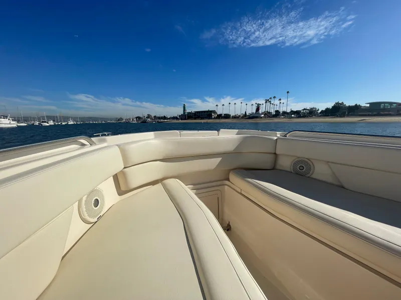 Slide: The Image of 2017 Grady-White 307 Freedom boat interior with ocean view and clear sky. - 14
