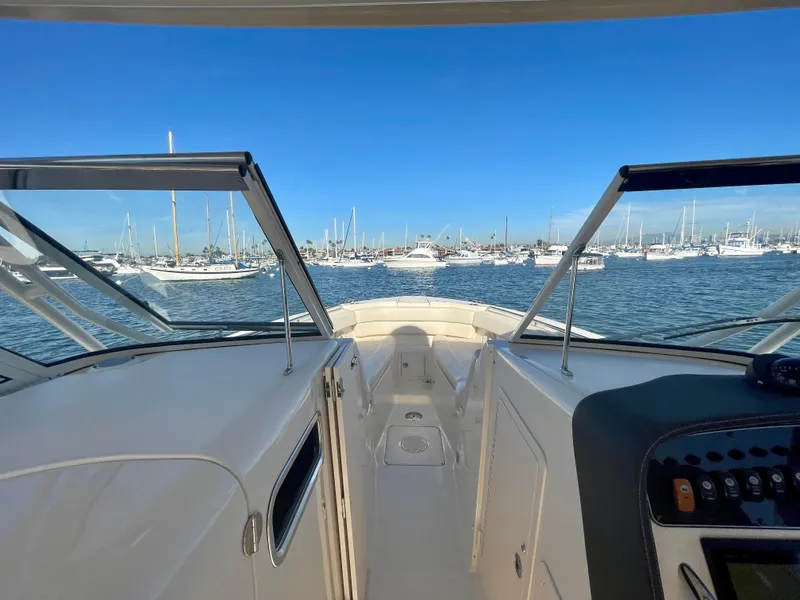 Slide: The Image of 2017 Grady-White 307 Freedom boat interior with marina view. - 23