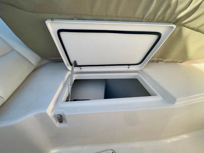 Slide: The Image of Open storage compartment on 2017 Grady-White 307 Freedom boat. - 29