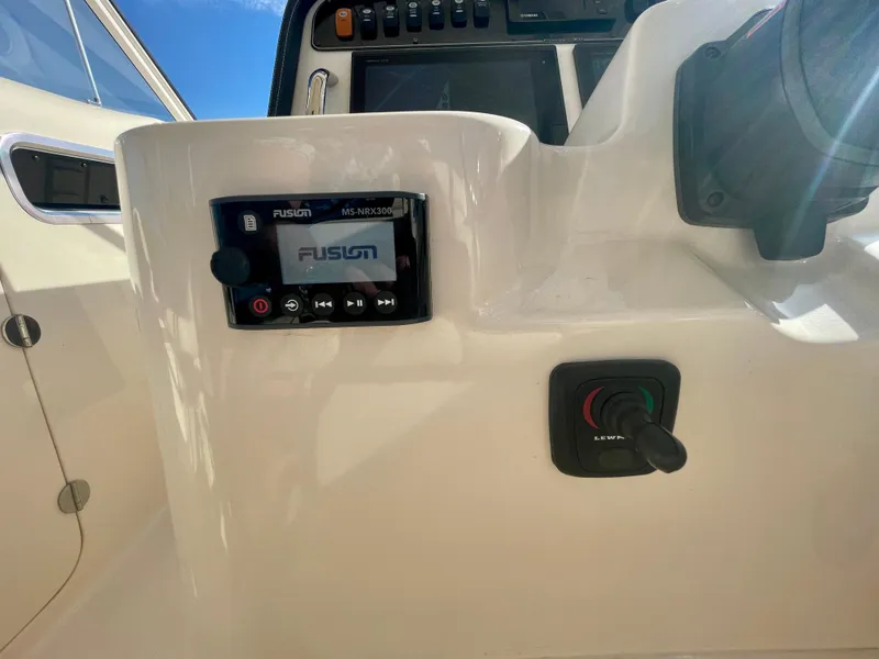 Slide: The Image of Grady-White 307 Freedom 2017 boat dashboard with Fusion stereo system. - 33