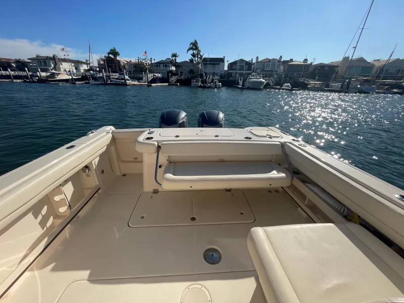 Slide: The Image of 2017 Grady-White 307 Freedom boat interior with waterfront view. - 36