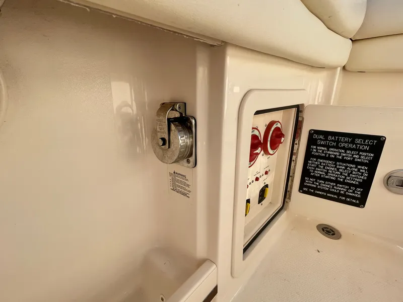 Slide: The Image of 2017 Grady-White 307 Freedom boat interior, featuring control panel and battery switch. - 39