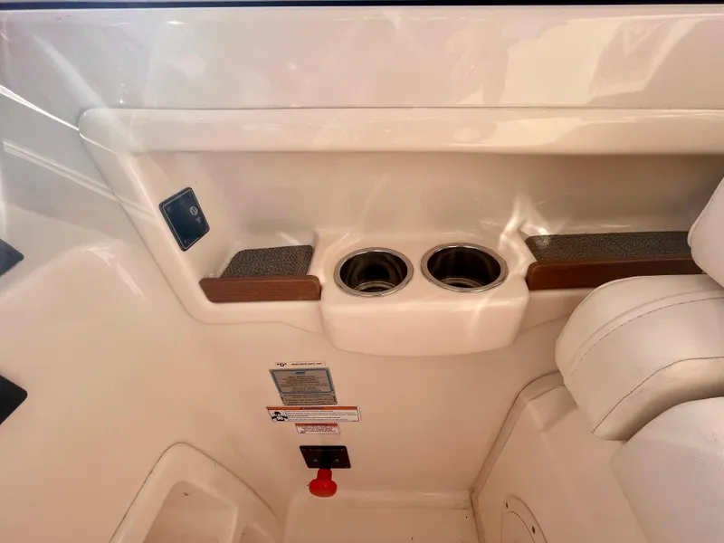 Slide: The Image of Interior of 2017 Grady-White 307 Freedom boat with cup holders and seating. - 42