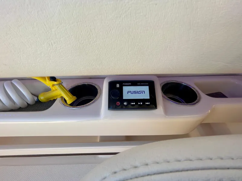 Slide: The Image of Grady-White 307 Freedom 2017 boat console with Fusion stereo and cup holders. - 43